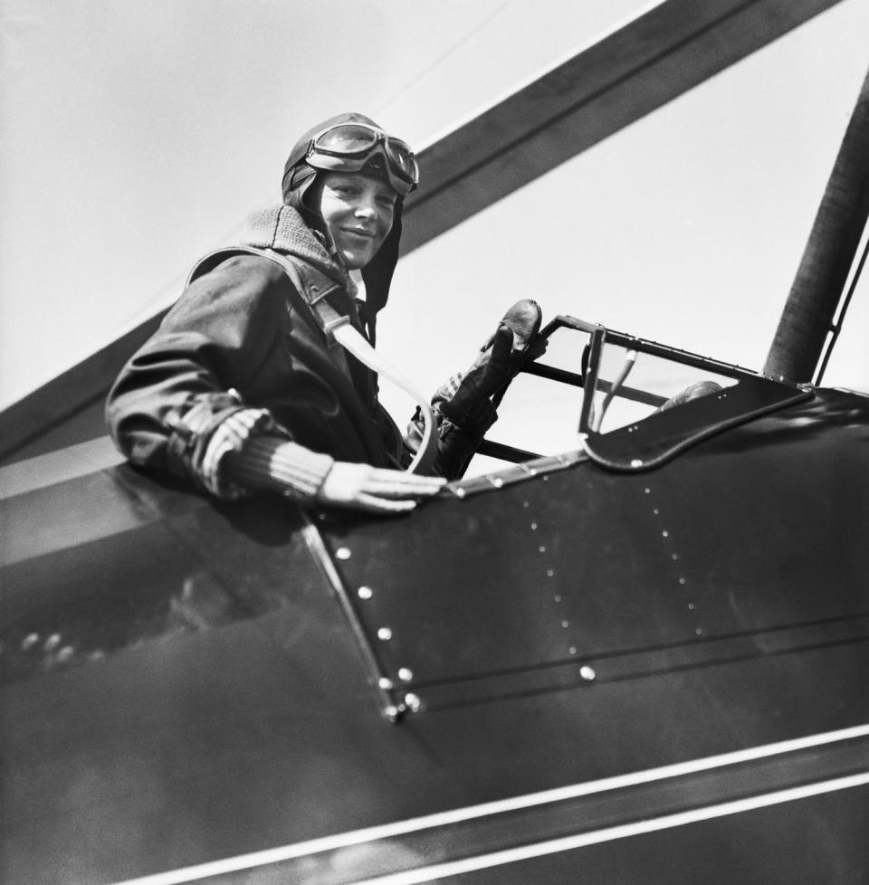 amelia earhart in airplane cockpit