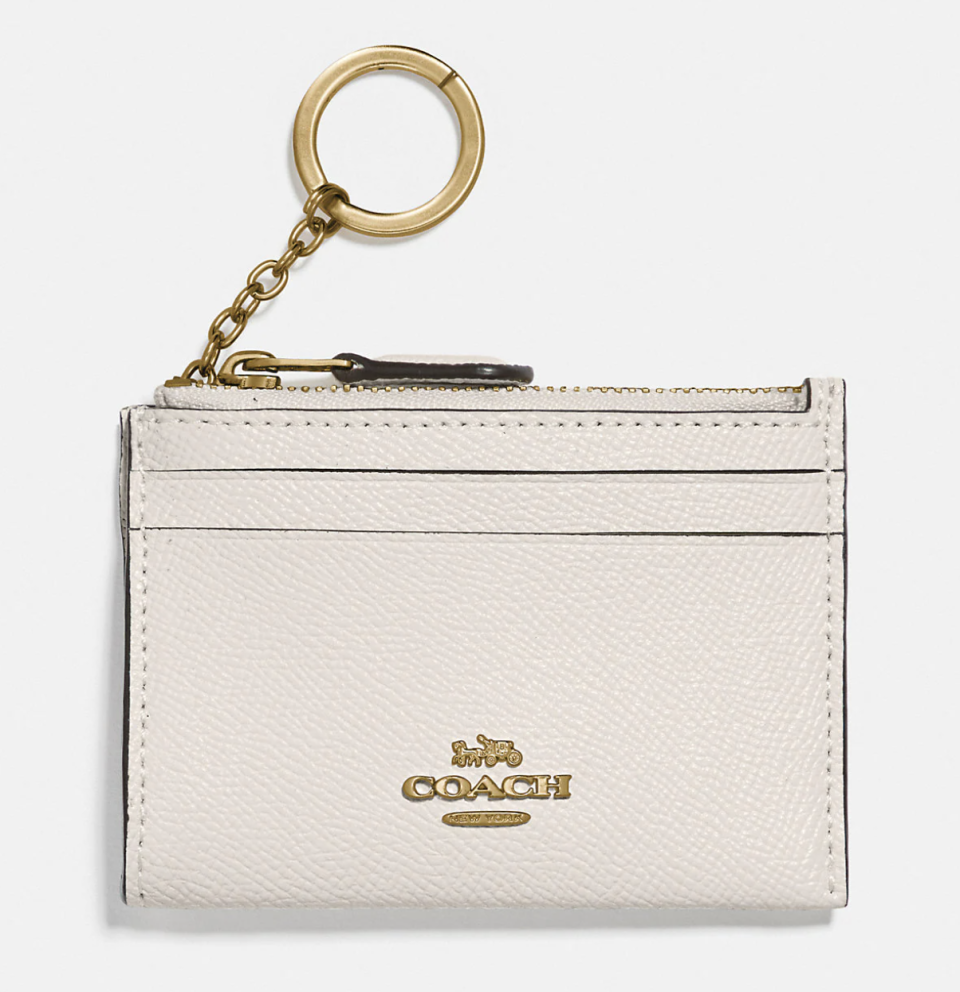 Mini Skinny Id Case in gold/chalk (Photo via Coach Outlet)
