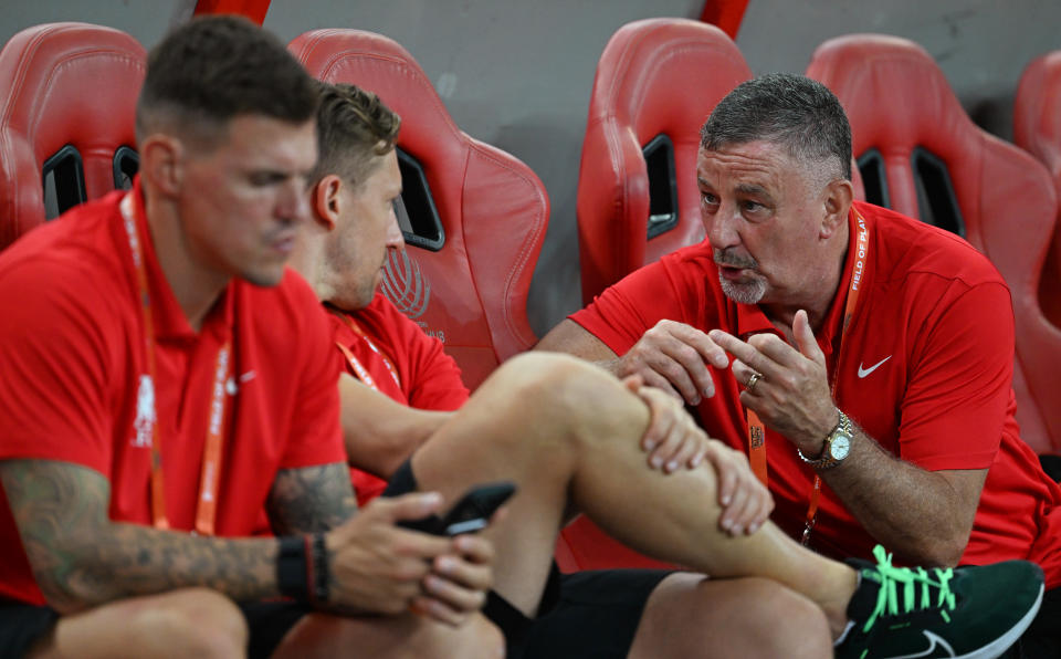 John Aldridge (right) chatting with Liverpool greats Martin Skrtel (left) and Lucas Leiva during the Singapore Festival of Football.