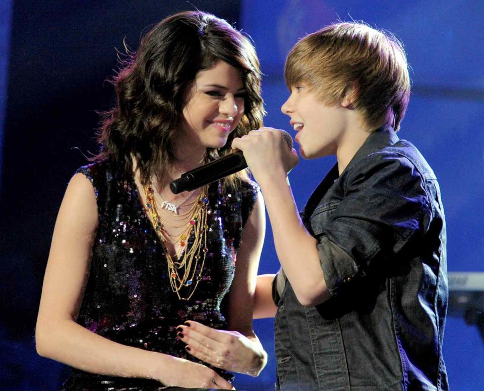 Selena Gomez (L) and Justin Bieber perform during Dick Clark's New Year's Rockin' Eve With Ryan Seacrest 2010 at Aria Resort & Casino at the City Center on December 31, 2009 in Las Vegas, Nevada