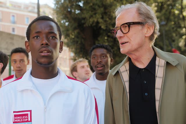 <p>Alfredo Falvo/Netflix</p> Micheal Ward (L) and Bill Nighy (R) in Netflix's <em>The Beautiful Game</em>