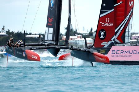 Sailing - America's Cup finals - Hamilton, Bermuda - June 24, 2017 - Oracle Team USA leads Emirates Team New Zealand around a mark in race six of America's Cup finals. REUTERS/Mike Segar