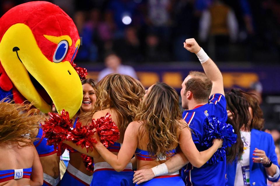 Kansas' mascot and cheerleaders celebrate after defeating Villanova.