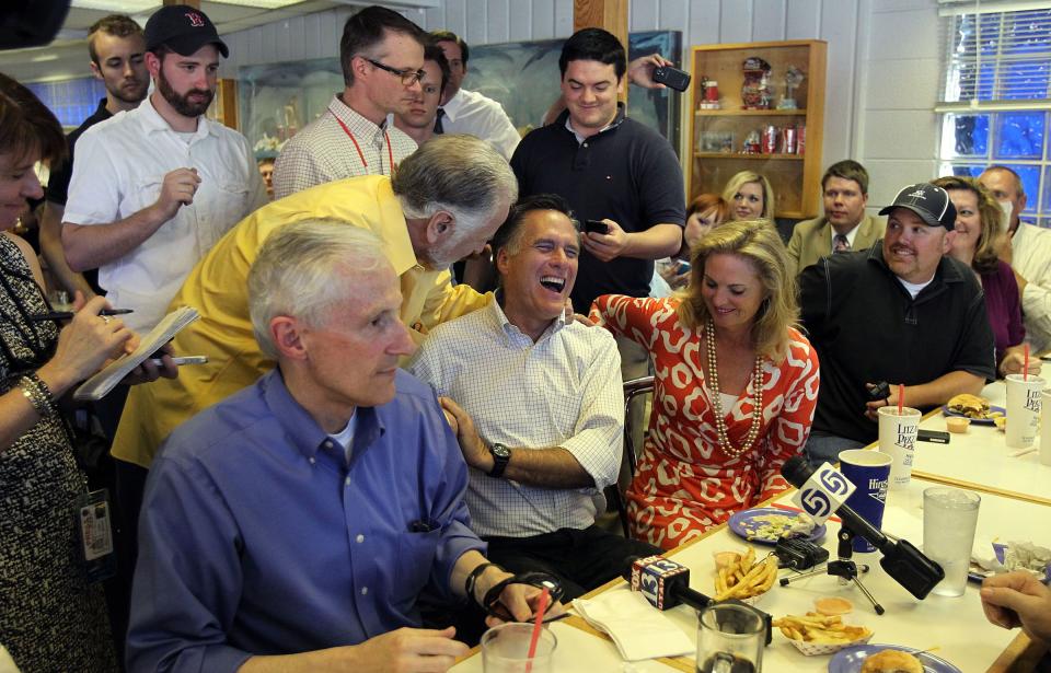 Mitt Romney is greeted by Dick Nourse after he meets with business people at Hires Big H Drive-in, on June 24, 2011, in Salt Lake City. | Ravell Call, Deseret News