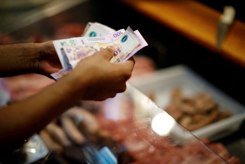 FILE PHOTO: Argentina inflation tops 100% for first time since 1991