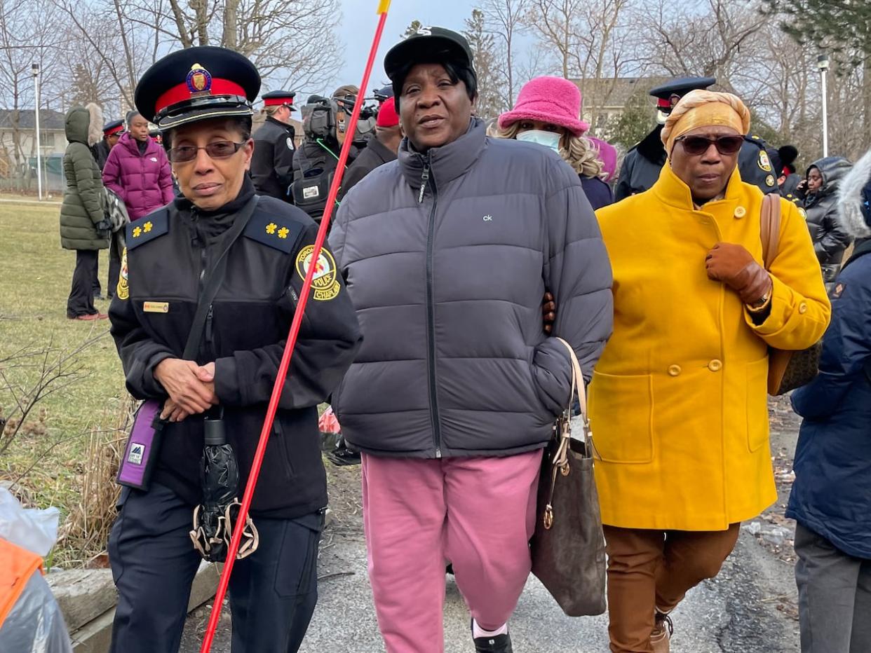 A prayer walk in northwest Toronto was held after two shootings near Jane Street and Driftwood Avenue left a man dead and a teen boy injured. (Pelin Sidki/CBC - image credit)