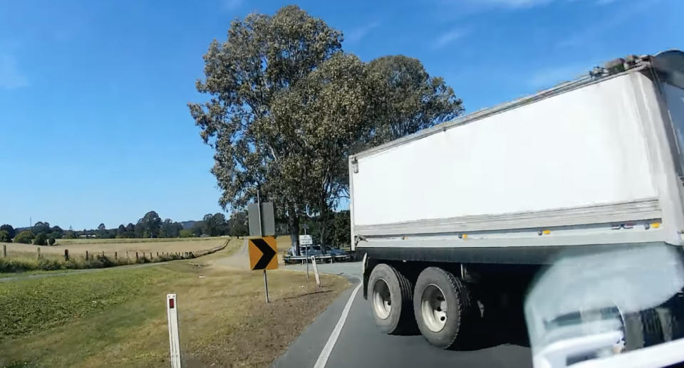 The truck's trailer swung out and hit the 4WD, injuring the driver. 