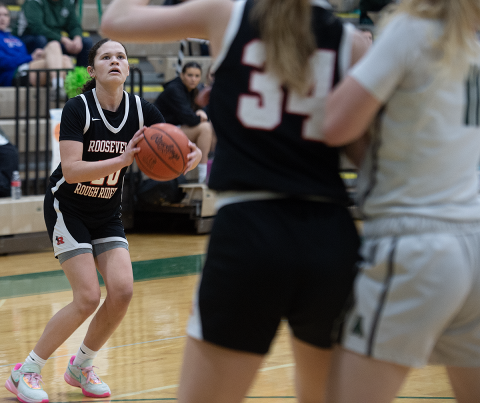 Ari Crockett takes a shot. Aurora hosted Kent Roosevelt on Saturday, February 4.