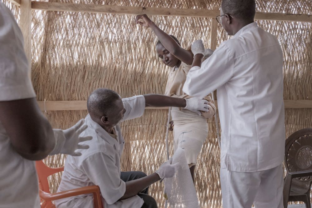 Ahmat Abakar Bakhit, a 27-year-old Sudanese refugee, gets fitted for a prosthesis at a clinic run by the charity Handicap International in Abutengue refugee camp. Ahmat lost a leg in a bombing back in his native Sudan, and his injuries have complicated the already-difficult task of adapting to his new life as a refugee in Chad. But now, thanks to the crucial contribution of the European Union, he has received a prosthesis and is undergoing physical therapy aimed at teaching him how to adapt to the new limb.<span class="copyright">Nicolò Filippo Rosso</span>