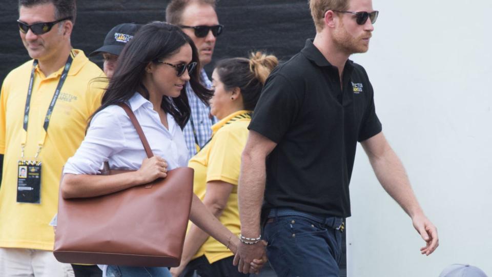 Meghan Markle and Prince Harry appear together at the wheelchair tennis on day 3 of the Invictus Games Toronto 2017 on September 25, 2017 in Toronto, Canada. The Games use the power of sport to inspire recovery, support rehabilitation and generate a wider understanding and respect for the Armed Forces. (Photo by Samir Hussein/WireImage)