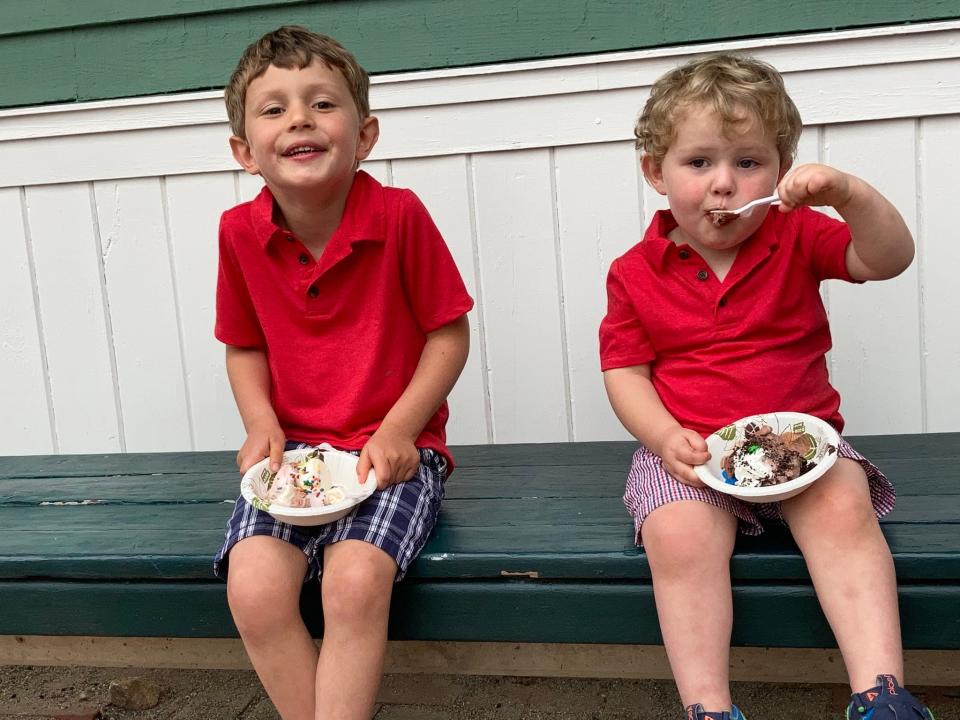 Two young guests enjoy their ice cream sundaes following their trolley ride at one of Seashore Trolley Museum’s past Ice Cream Night events.