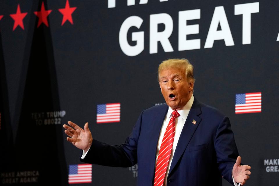 Republican presidential candidate former President Donald Trump arrives to speak at a commit to caucus rally, Saturday, Jan. 6, 2024, in Clinton, Iowa. (AP Photo/Charlie Neibergall)