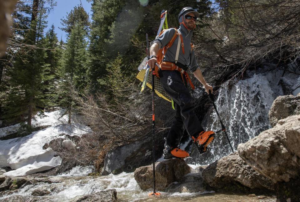 Backcountry skier Remy Michele crosses the North Fork of Lone Pine Creek.