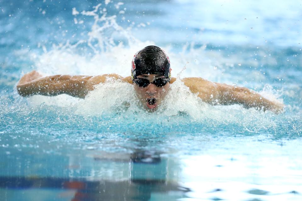 Carl Albert's Kaleb Vaughn swims in the 100-yard butterfly during the Class 5A state meet at Edmond Schools Aquatic Center on Feb. 18.