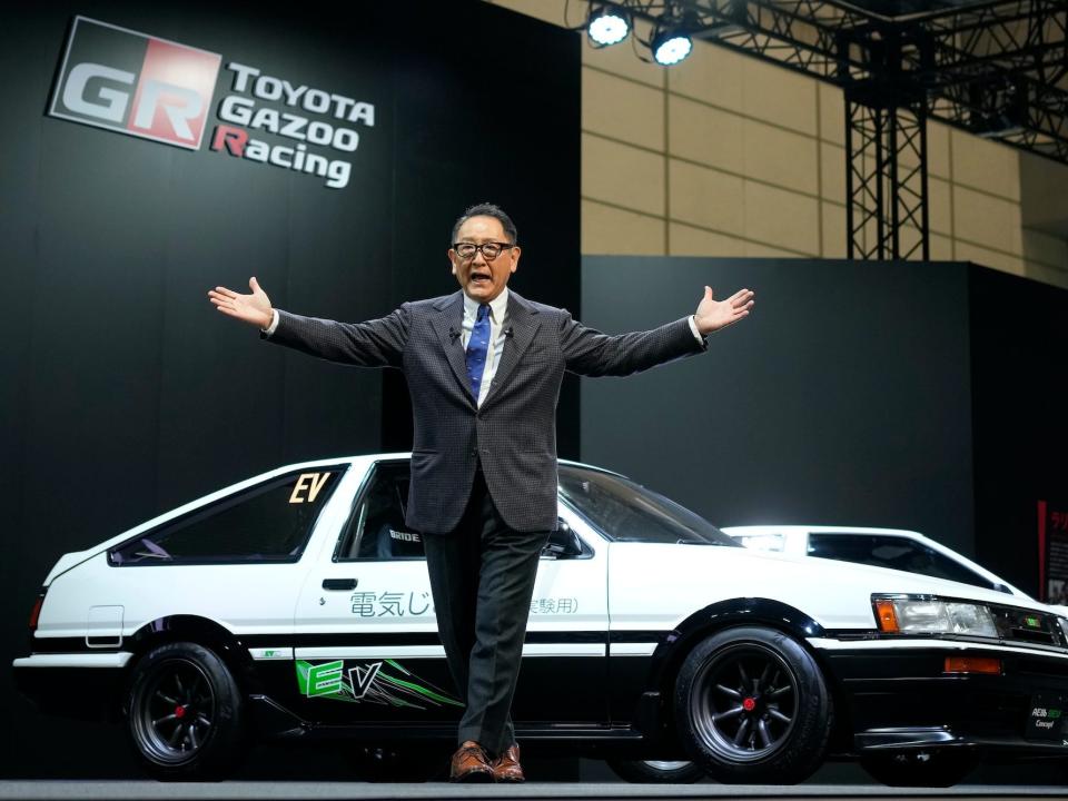 Toyota CEO Akio Toyoda delivers a speech on the stage at the Tokyo Auto Salon.