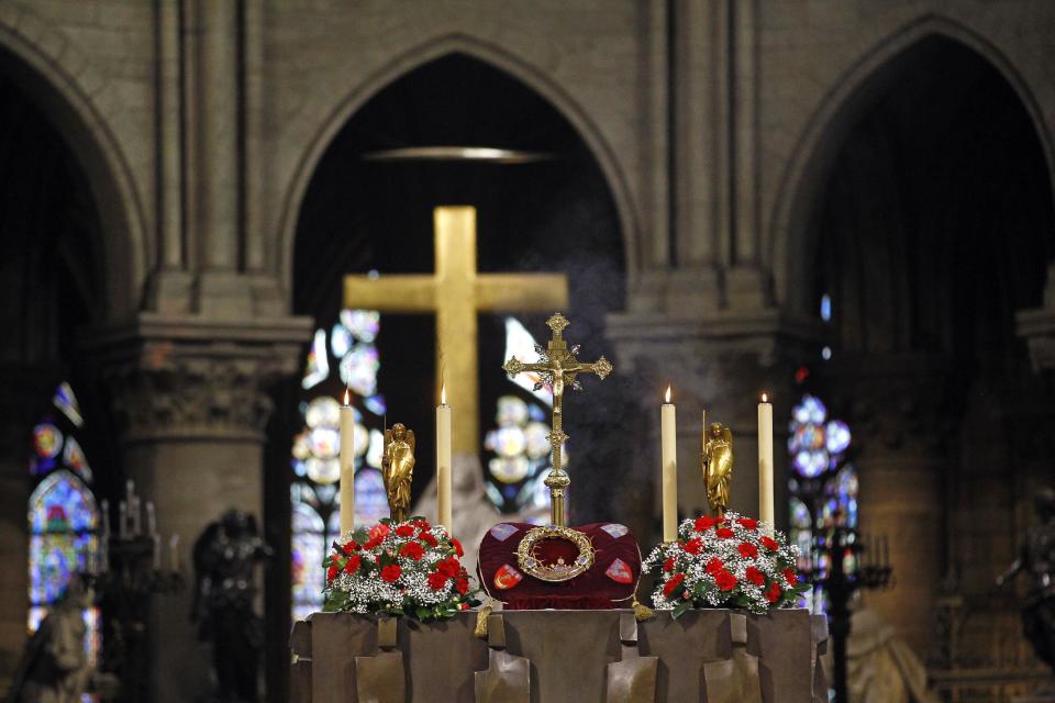 A crown of thorns which was believed to have been worn by Jesus Christ and which was bought by King Louis IX in 1239 is presented at Notre Dame Cathedral in Paris, Friday March 21, 2014. To mark the 800th anniversary of Louis IX's christening, the crown of thorns will be displayed outside Notre Dame, at the Collegiate Church of Poissy, where King Louis IX was christened. (AP Photo/Remy de la Mauviniere)