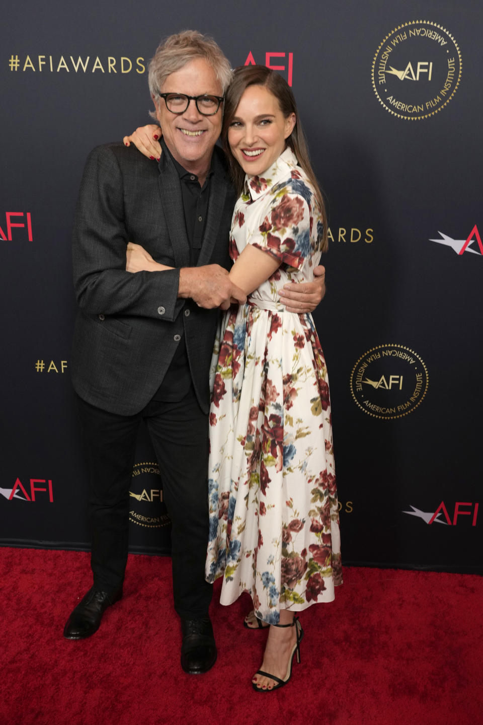 Todd Haynes, left, and Natalie Portman arrive at the AFI Awards on Friday, Jan. 12, 2024, at the Four Seasons Beverly Hills in Beverly Hills, Calif. (AP Photo/Chris Pizzello)