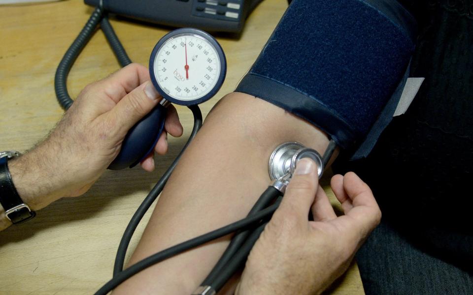 File photo dated 10/09/14 of a doctor checking a patient's blood pressure. The number of notes issued by doctors saying someone is not fit to work due to stress-related disorders increased by 8% last year, new research suggests. PA Photo. Issue date: Monday February 10, 2020. There were 741,210 so-called "fit notes" handed out due to stress, compared with 686,670 the previous year, said employment law firm GQ Littler. -  Anthony Devlin/PA