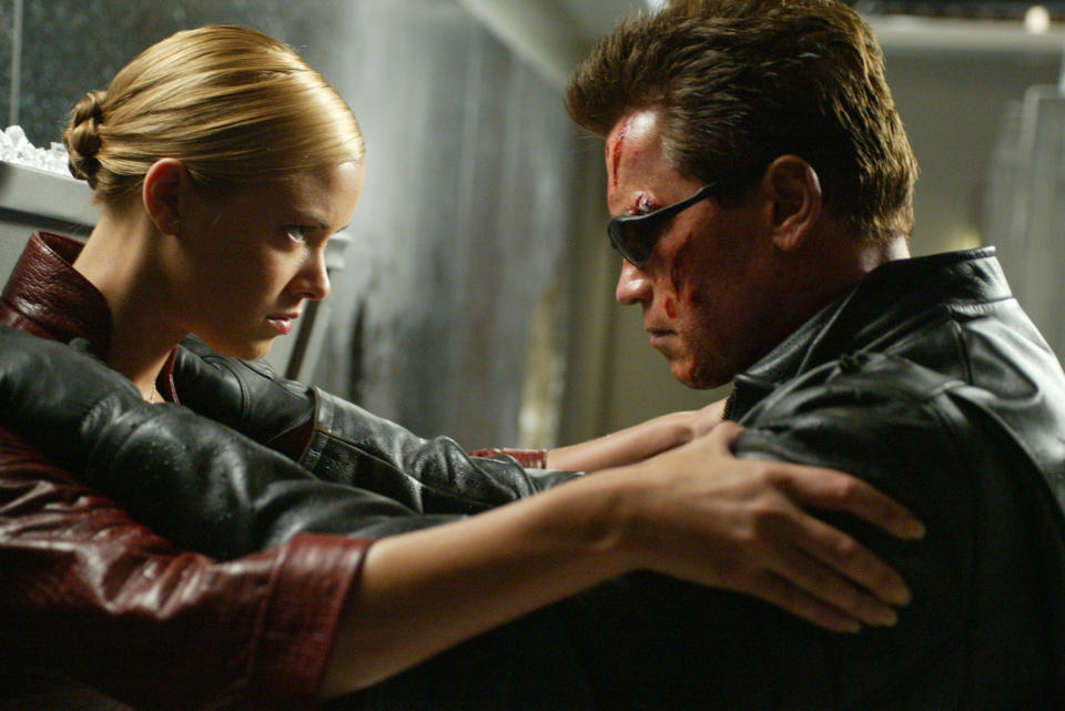 Arnold Schwarzenegger as Terminator and Kristanna Loken as T-X. Terminator 3: Rise of the Machines (Columbia Tristar)