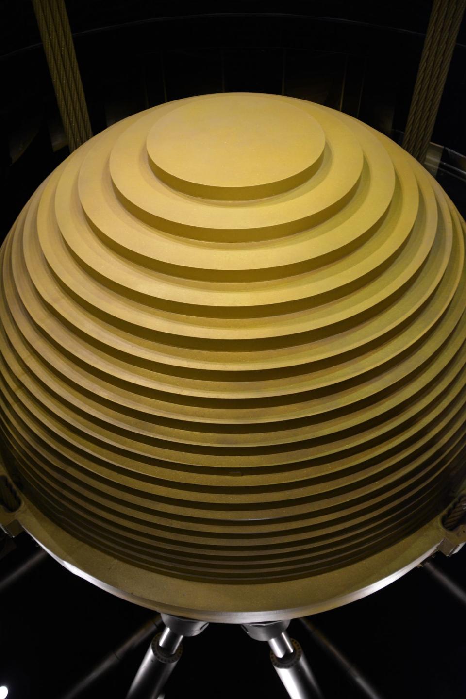 Tuned mass damper or harmonic absorber inside the Taipei 101 skyscraper helps reduce the amplitude of mechanical vibrations to endure against earthquakes