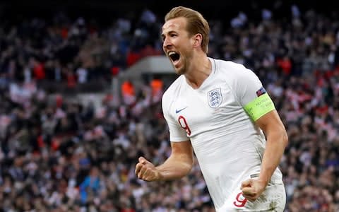 Harry Kane celebrates scoring their second goal - Credit: Reuters