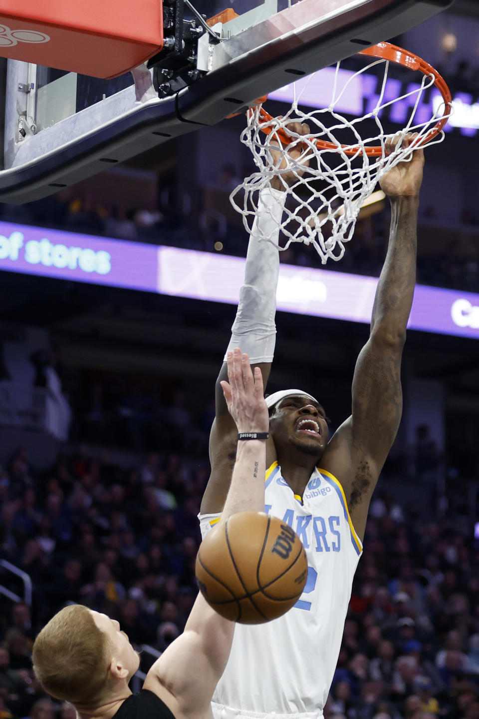 Los Angeles Lakers guard Jarred Vanderbilt shoots against Golden State Warriors guard Donte DiVincenzo (0) during the second half of an NBA basketball game in San Francisco, Saturday, Feb. 11, 2023. (AP Photo/Jed Jacobsohn)