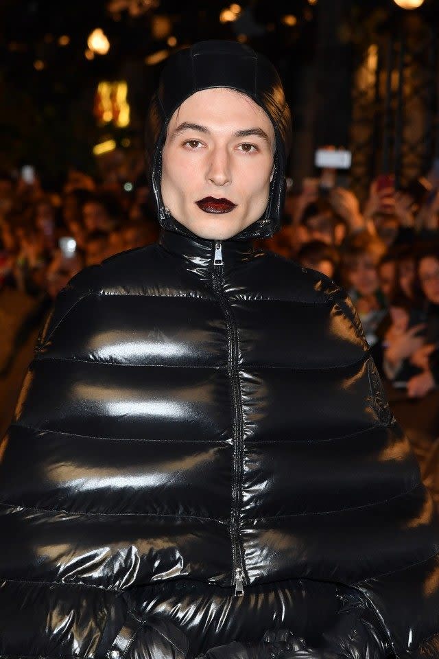 The 26-year-old actor made a dramatic fashion statement in a full head-to-toe black puffer ensemble and vampy dark lips.