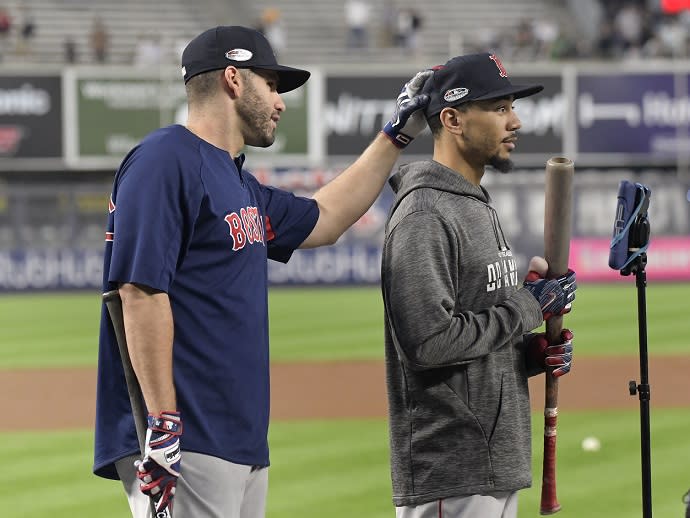 AL MVP candidates J.D. Martinez (left) and Mookie Betts are the main forces leading the Red Sox offense. (AP)