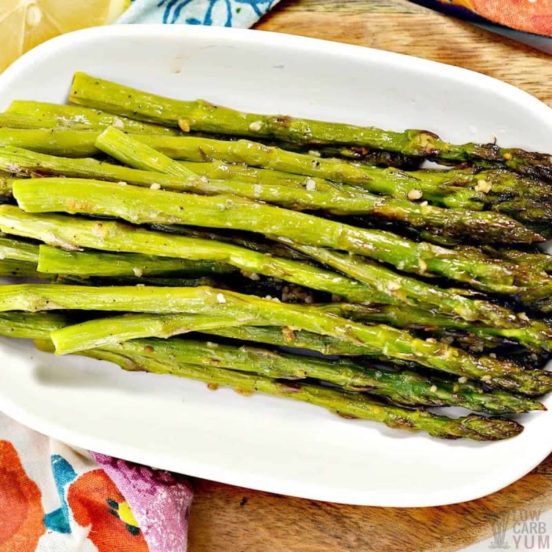 <p>Low Carb Yum</p><p>A touch of lemon makes this asparagus side dish so tasty. It's an easy oven-roasted vegetable side dish that's sure to become a favorite.</p><p><strong>Get the recipe: </strong><a href="https://lowcarbyum.com/oven-roasted-asparagus/" rel="nofollow noopener" target="_blank" data-ylk="slk:Oven-Roasted Asparagus;elm:context_link;itc:0;sec:content-canvas" class="link "><strong>Oven-Roasted Asparagus</strong></a></p>