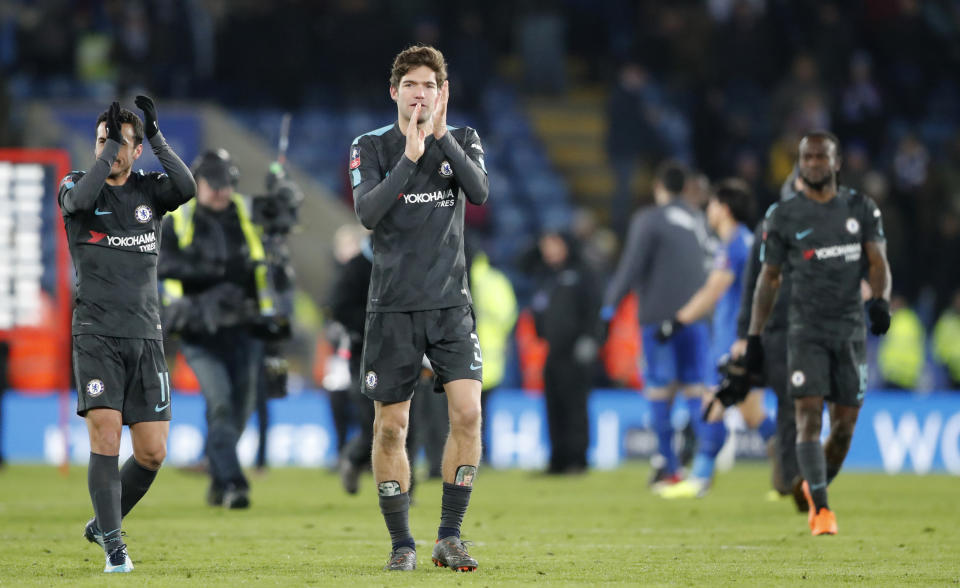 Chelsea’s Marcos Alonso, center celebrates with his teammates