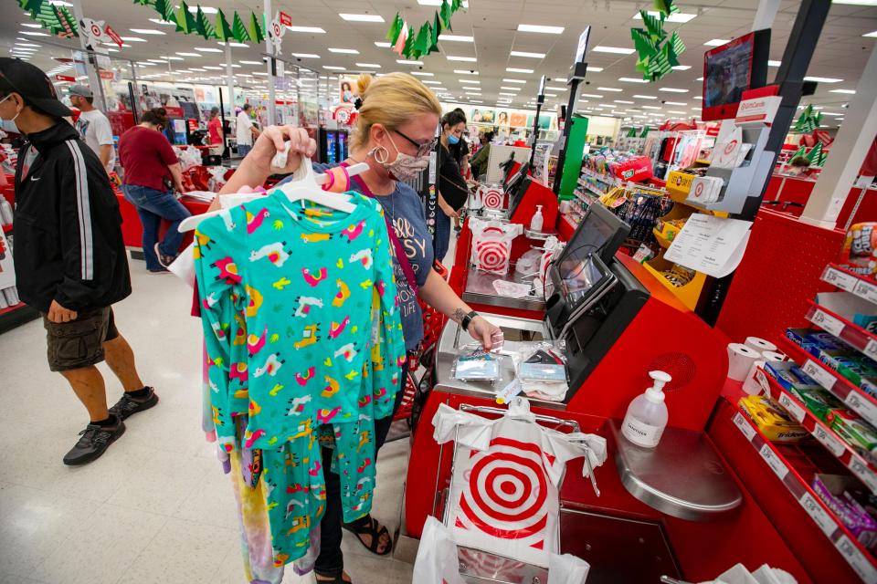 Beverly Watson checks out her Black Friday shopping deals at Target in Ocala, Florida on Friday November 27, 2020.