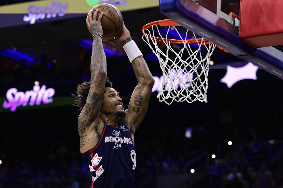 Philadelphia 76ers' Kelly Oubre Jr. goes up for a dunk during the first half of an NBA basketball game against the Detroit Pistons, Tuesday, April 9, 2024, in Philadelphia. (AP Photo/Derik Hamilton)
