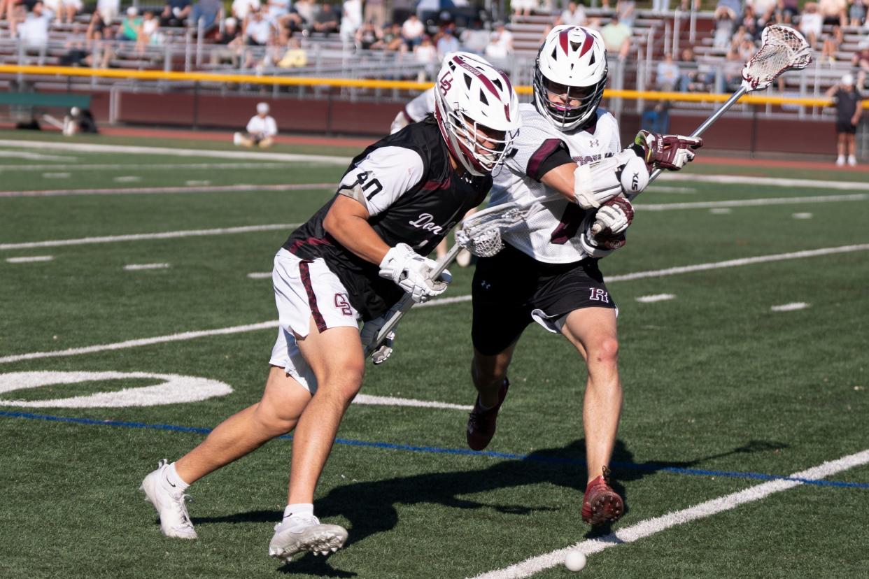 May 2, 2024; Ridgewood, NJ, USA; Don Bosco boys lacrosse at Ridgewood. DB #40 Benjamin Linder and RW #6 Jack Schultz.