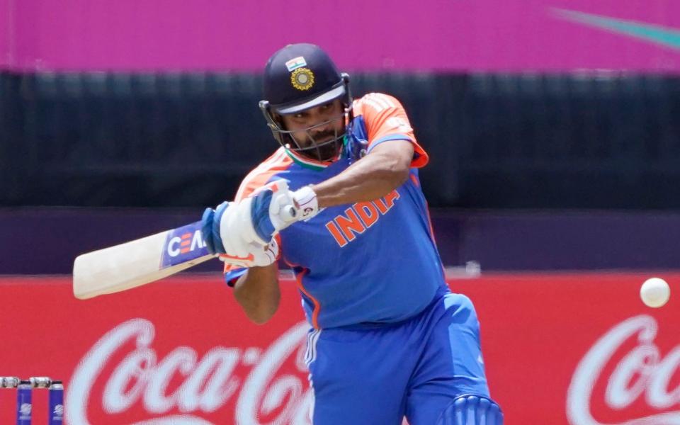 India's captain Rohit Sharma pulls a short ball against Ireland during the Twenty20 World Cup