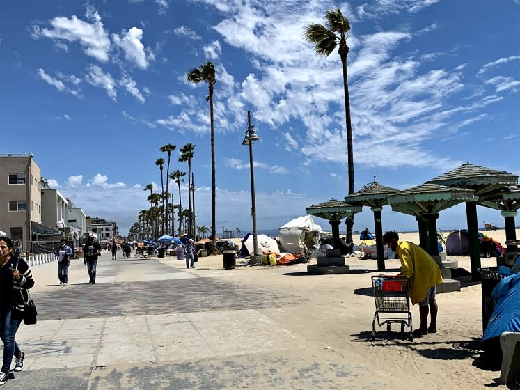 VENICE BEACH, CALIF. - JUNE 23, 2021 - Looking south down the Venice boardwalk. (Carla Hall / Los Angeles Times)