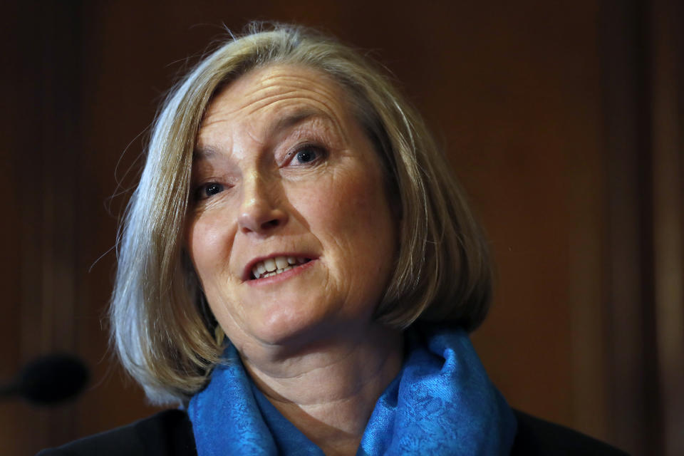 British lawmaker Sarah Wollaston speaks at a press conference in Westminster in London, Wednesday, Feb. 20, 2019. Cracks in Britain's political party system yawned wider Wednesday, as three pro-European lawmakers - Soubry, Allen and Wollaston - quit the governing Conservatives to join a newly formed centrist group of independents who are opposed to the government's plan for Britain's departure from the European Union.(AP Photo/Alastair Grant)