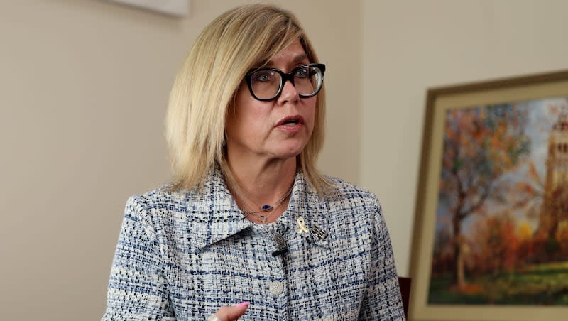 Diana Sabau, vice president and director of athletics at Utah State University, speaks to reporters in Salt Lake City on Friday, July 26, 2024.