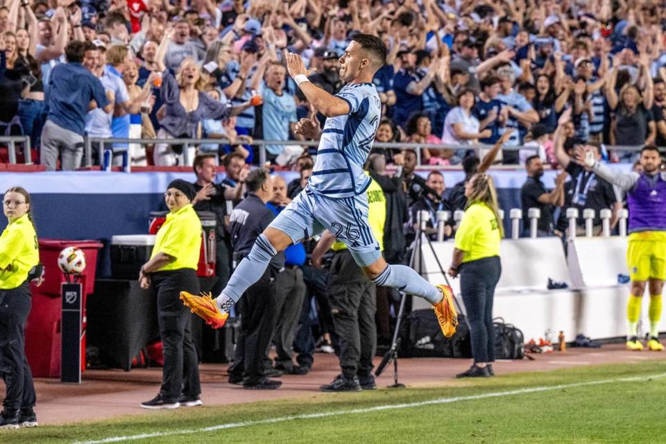 Sporting Kansas City midfielder Erik Thommy (26) celebrates his second goal in the second half during an MLS game between Inter Miami at GEHA Field at Arrowhead Stadium on Saturday, April 13, 2024, in Kansas City.