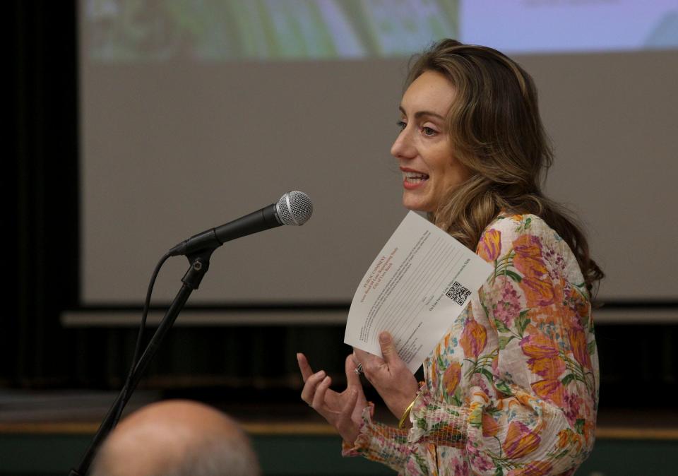 Audrey Mosel, owner of Seahorse Lane Boutique in downtown Vero Beach, speaks at a State Road 60 Twin Pairs Lane Reduction Study presentation, Thursday, Oct. 5, 2023, at the Vero Beach Community Center on 14th Avenue. "Our downtown has so much potential," Mosel said during a question-and-answer session. "You can see that with all of the business owners that have come in and invested and made a home here. I just want to say thank you for doing that study." Over 100 impassioned residents packed into the building to learn of the proposal and voice their concerns, support or opposition.