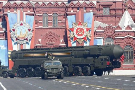 A Russian mobile Topol-M missile launching unit drives during the Victory Day parade in Moscow's Red Square May 9, 2014. REUTERS/Grigory Dukor