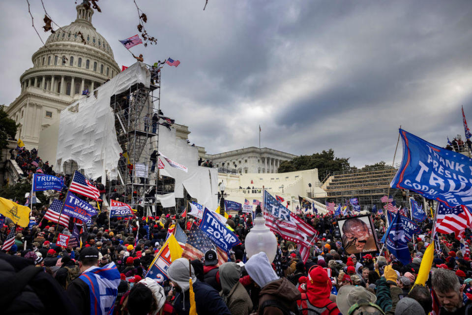 Trump supporters clash with police and security forces as people try to storm the US Capitol on January 6, 2021 in Washington, DC. Demonstrators breeched security and entered the Capitol as Congress debated the 2020 presidential election Electoral Vote Certification. / Credit: Brent Stirton / Getty Images