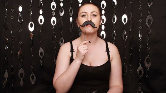 The 'Student photographer' snapped pictures of herself in the couple's photo booth they hired for guests. Photo: Caters