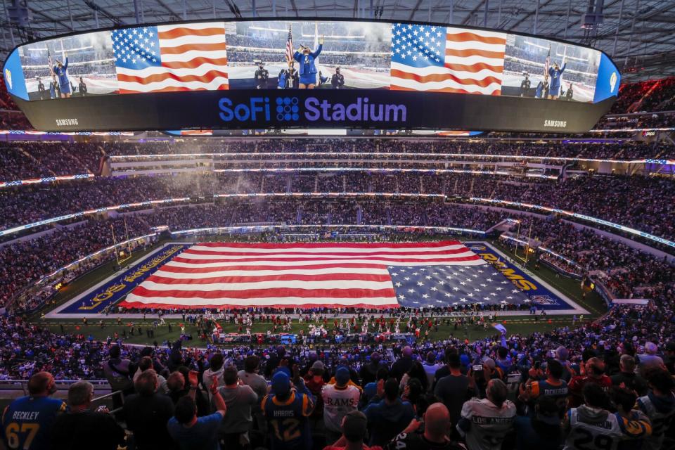 Shelea performs the national anthem in a packed SoFi Stadium before the Rams play the Cardinals