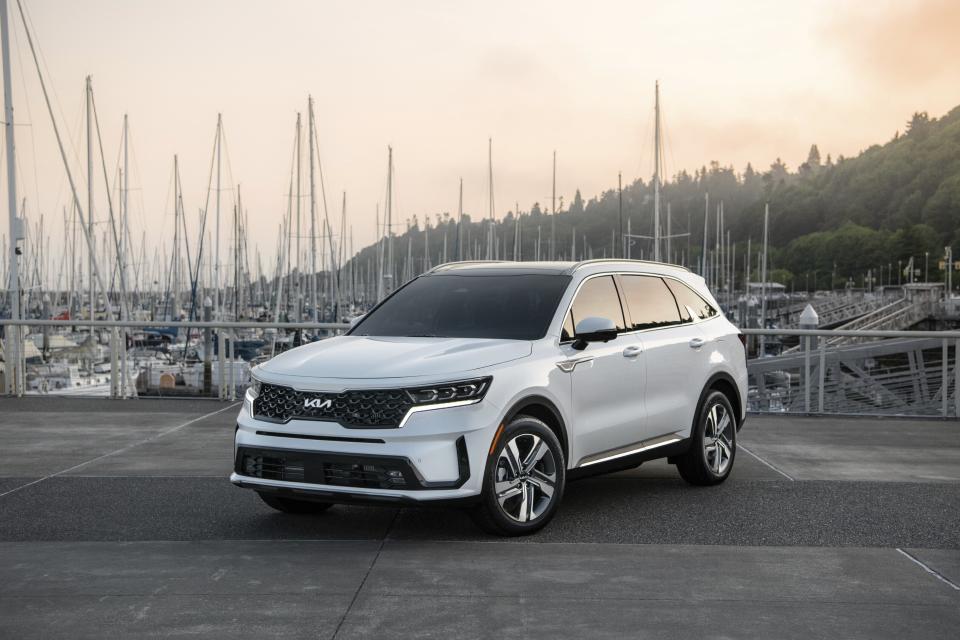 This photo provided by Kia shows the Sorento Plug-in Hybrid. A midsize SUV with three rows of seating, the Plug-in Hybrid version can drive 32 miles on all electric power. (Courtesy of Kia America via AP)