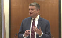 In this screen grab from video, Assistant Minnesota Attorney General Matthew Frank questions a potential juror and Hennepin County Judge Regina Chu presides over jury selection Tuesday, Nov. 30, 2021, in the trial of former Brooklyn Center police Officer Kim Potter in the April 11, 2021, death of Daunte Wright, at the Hennepin County Courthouse in Minneapolis, Minn. (Court TV, via AP, Pool)