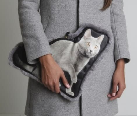 This cat purse is made with animal fur. 