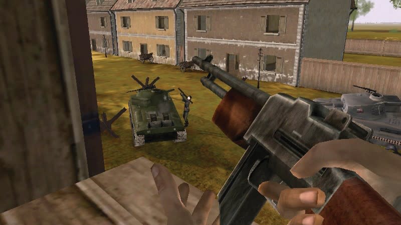 A soldier firing at a tank in Battlefield 1942.