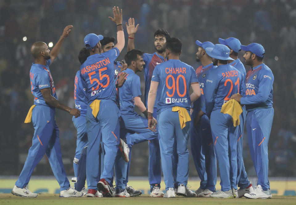 Indian players celebrates the wicket of Bangladesh's Mohammad Naim during their third Twenty20 international cricket match against India in Nagpur, India, Sunday, Nov. 10, 2019.(AP Photo/Rafiq Maqbool)