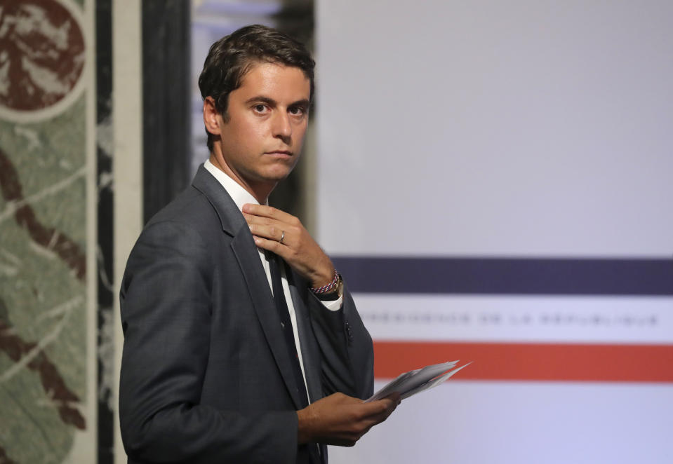 FILE - French Government's spokesperson Gabriel Attal arrives for a press conference after the weekly cabinet meeting at the Elysee Palace in Paris, Wednesday July 29, 2020. French President Emmanuel Macron's choice to appoints a 34-year-old prime minister surprised many _ because of his young age and relatively short career. But Gabriel Attal has become in recent years one of the most prominent and ambitious figures on the French political scene, considering there's "nothing greatest than serving France." ( Ludovic Marin, Pool via AP, File)