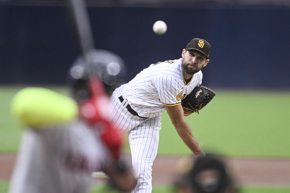 San Diego Padres starting pitcher Michael Wacha watches a throw during the first inning of the team's baseball game against the Cleveland Guardians on Wednesday, June 14, 2023, in San Diego. (AP Photo/Denis Poroy)